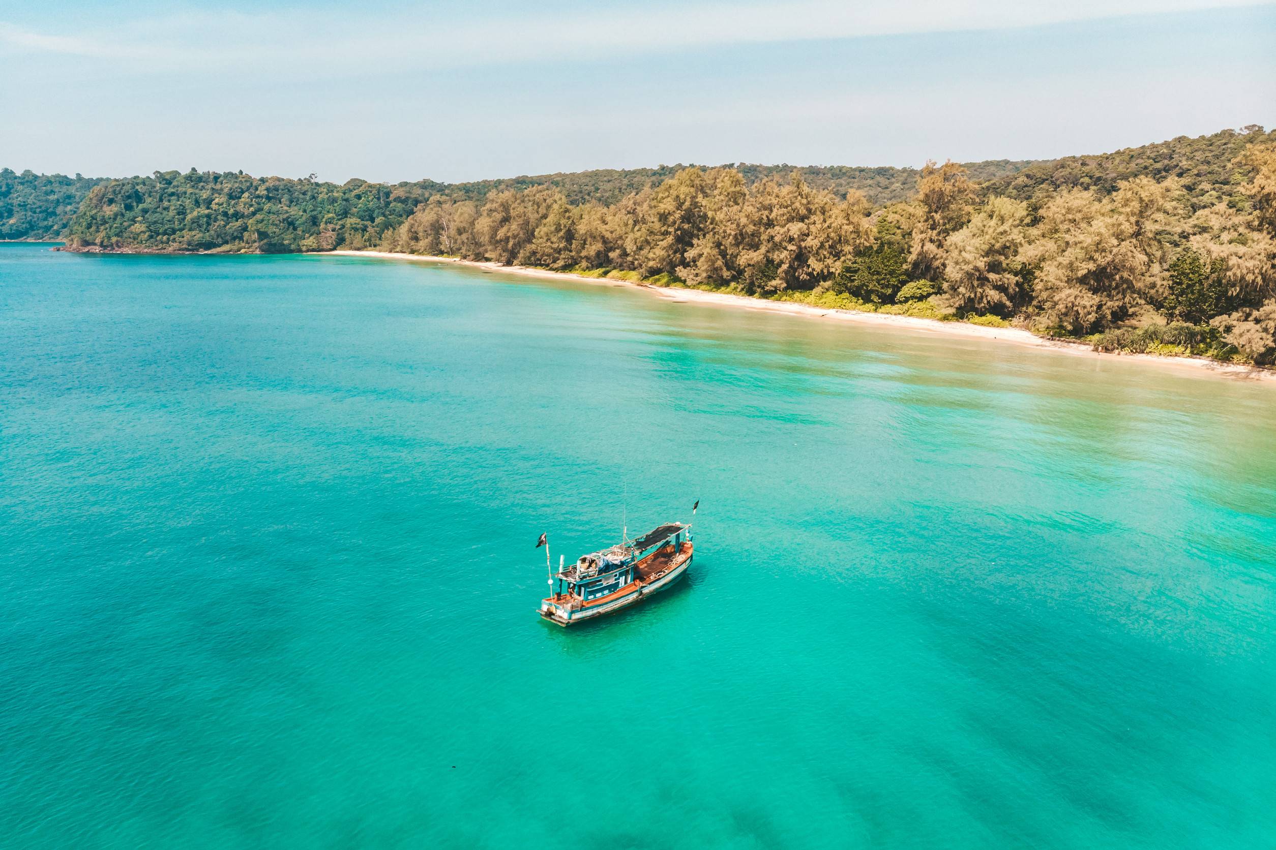 Fishing Boats In The Crystal Clear Turquoise Water Of The Sea