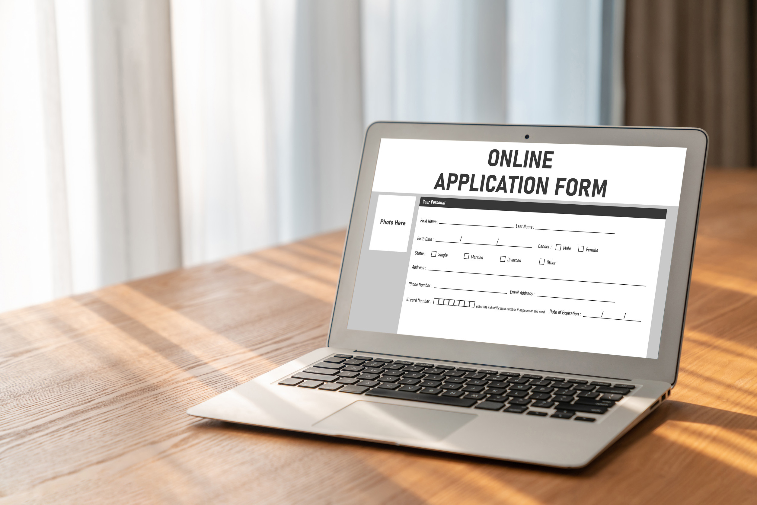 Laptop screen showing online application form