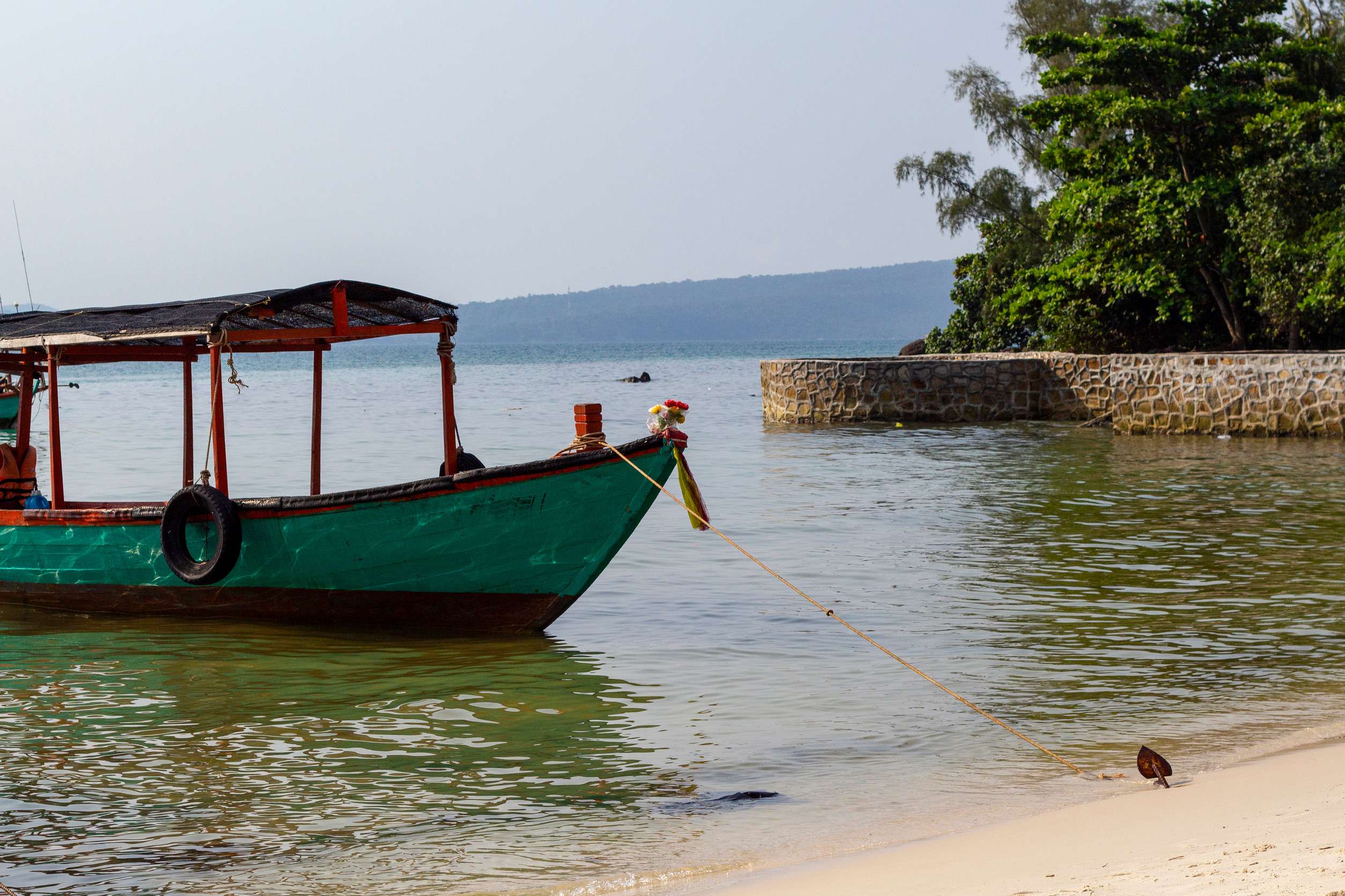 Traditional Wooden Fishing Boat On Koh Rong Beach Cambodia